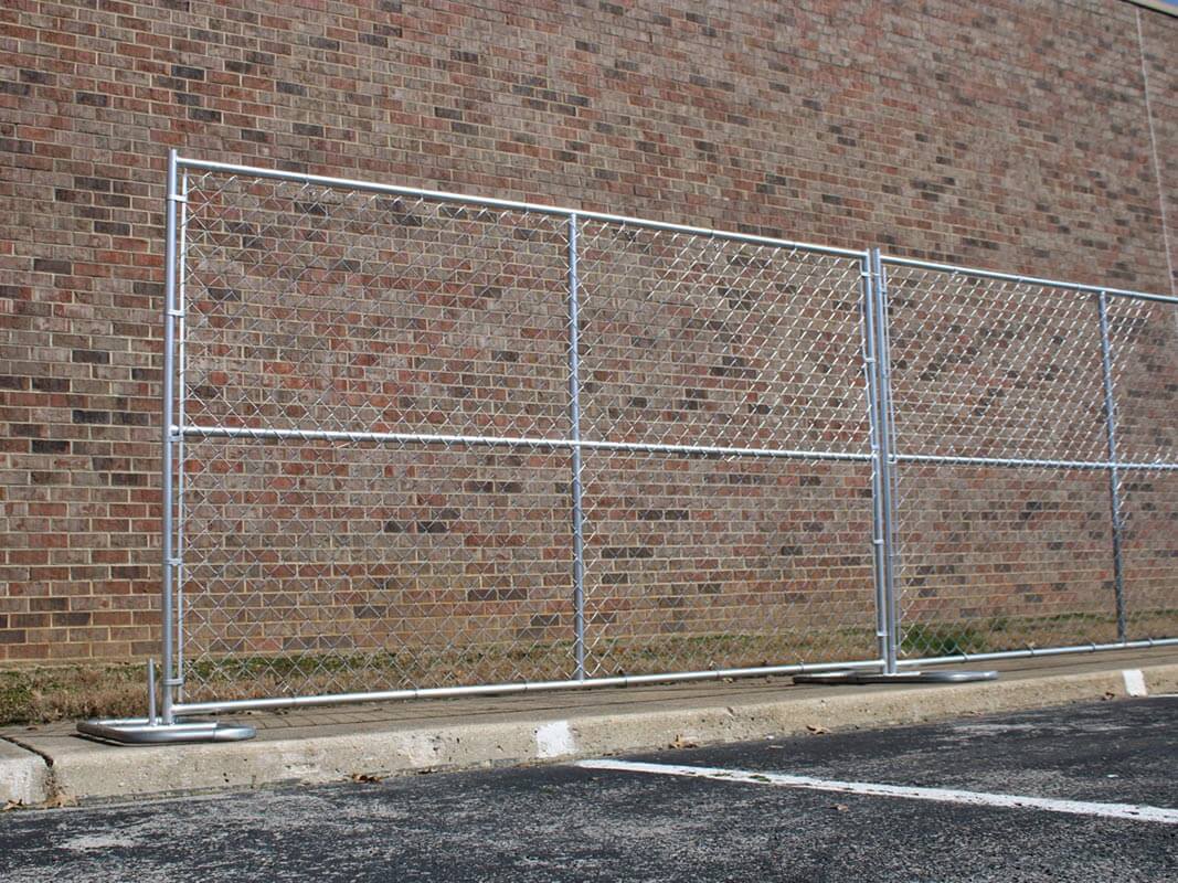 Temporary chain link fence installed outside of a building in St. Louis Missouri