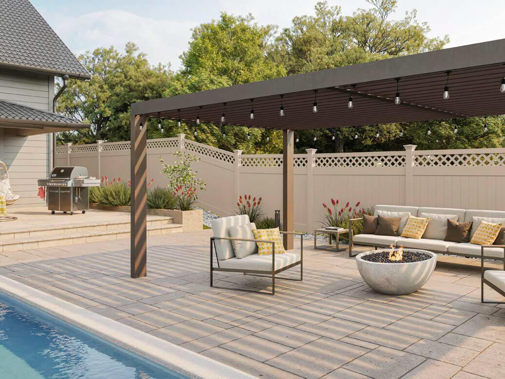 Lattice top tan vinyl fence installed around a backyard with a pool in St. Louis Missouri